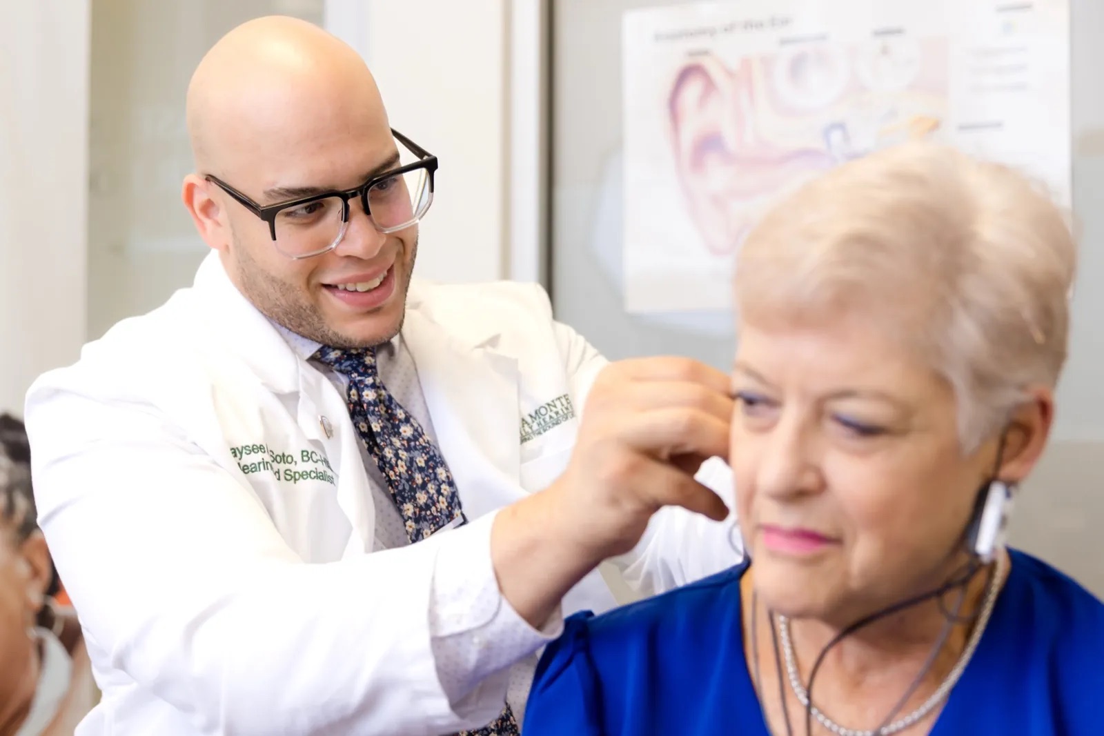 Jaysee Soto performing Real Ear Measurement to verify a patient's hearing aid fitting at Altamonte Family Hearing